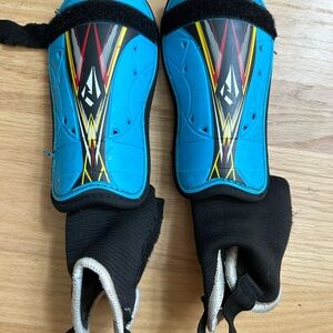 Rawxy Blue soccer Shin Guards with Black Straps Sz s age 6/7